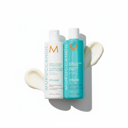 Moroccanoil Extra Volume Bundle with conditioner and shampoo bottles on white background