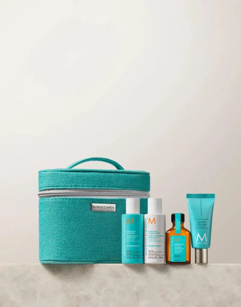 Teal cosmetic bag with Moroccanoil Hydration Travel Set and free 40ml hand cream