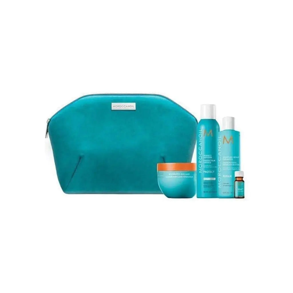 Teal cosmetic bag with Moroccanoil Joy Of Repair Holiday Gift Set 2021 hair care products