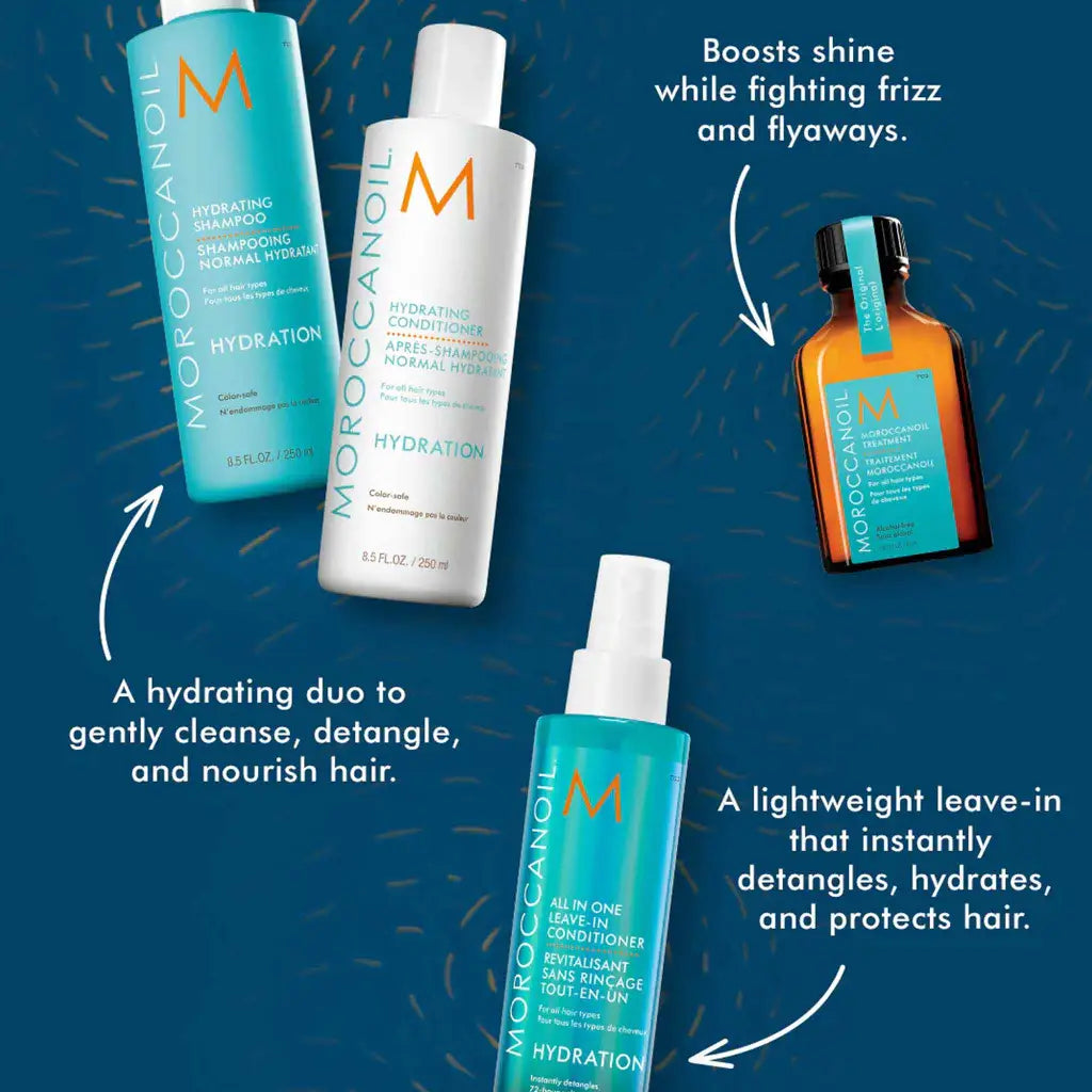 Collection of Moroccanoil hair care products displayed against a blue background.