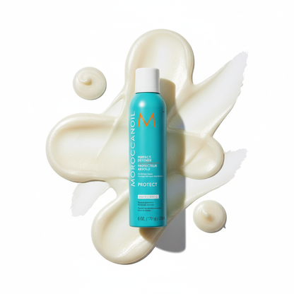 Moroccanoil Perfect Defense heat protectant spray bottle on white cream background