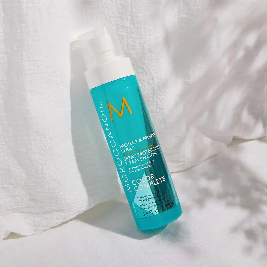 Turquoise bottle of Moroccanoil Protect & Prevent Spray 160ml for color care