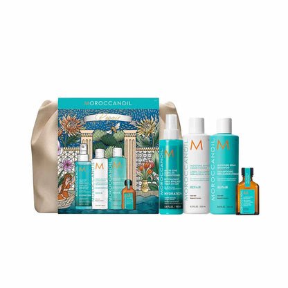 Moroccanoil hair care product set in a decorative travel bag.