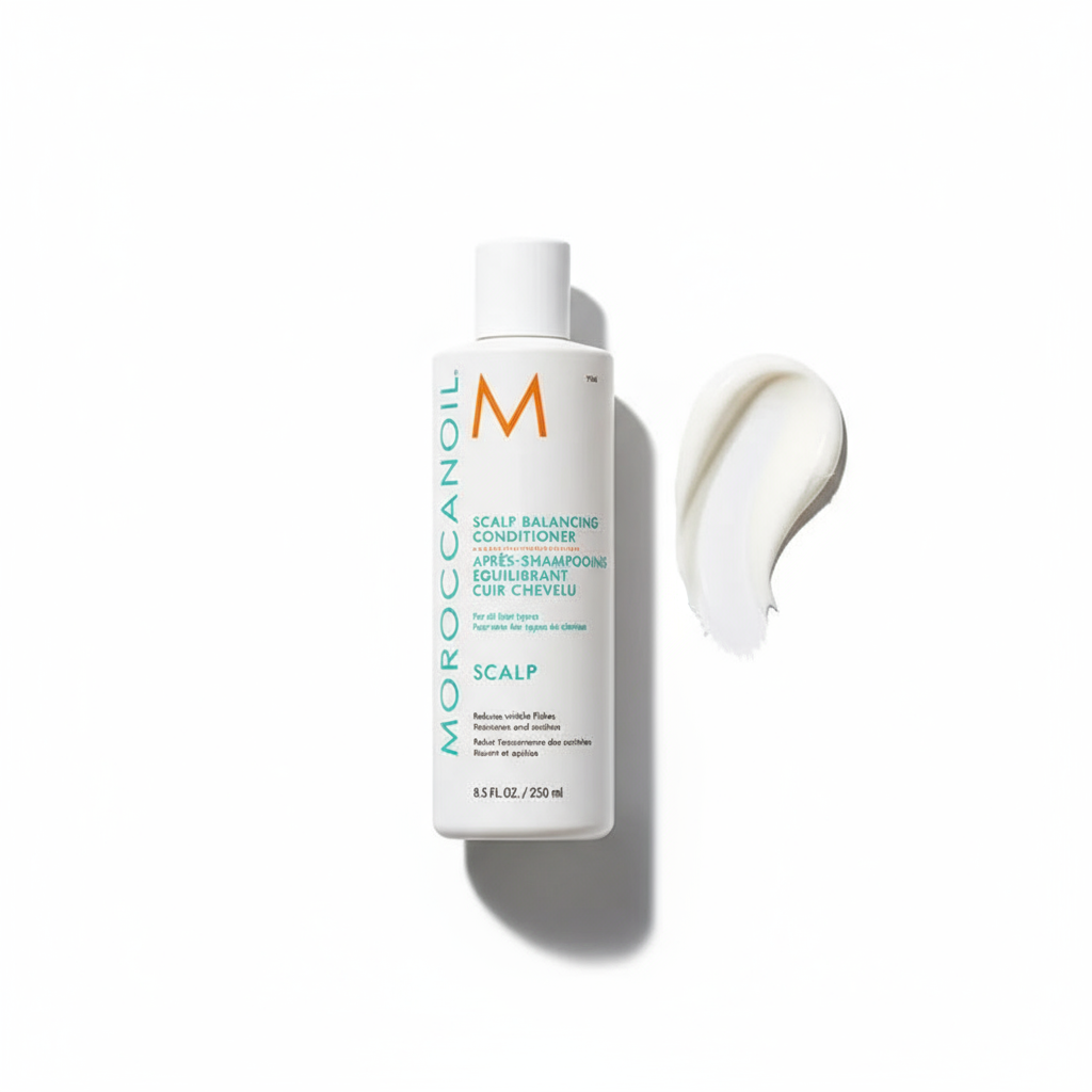 Moroccanoil scalp balancing conditioner bottle with creamy product swatch on white background