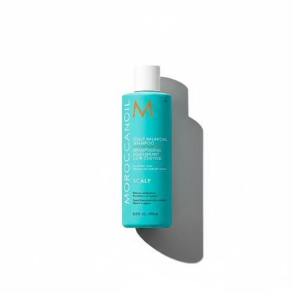 Moroccanoil scalp balancing shampoo bottle in turquoise with white cap for scalp care