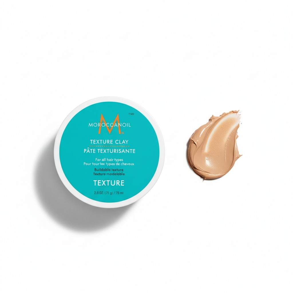 Moroccanoil Texture Clay styling aid container with a swatch of textured clay for hair
