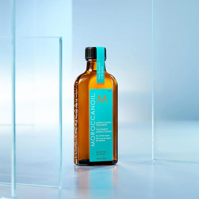Moroccanoil Treatment Oil 100ml nourishes all hair types with enriching Argan oil for healthier, radiant hair.