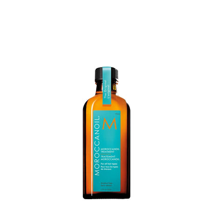 Moroccanoil Treatment Oil 100ml in a sleek bottle, perfect for nourishing all hair types with Argan oil.