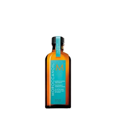 Nourish your hair with Moroccanoil Treatment Oil 100ml, perfect for all hair types and infused with Argan oil.