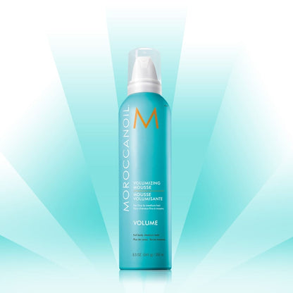 Turquoise aerosol can of Moroccanoil Volumizing Mousse 250ml for natural-looking styles