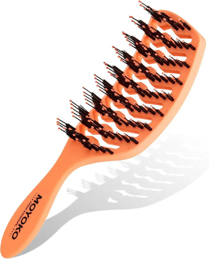 Orange hairbrush with black and white bristles arranged in rows.