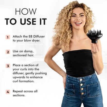 Curly-haired woman holding a hair diffuser attachment and demonstrating how to use it.