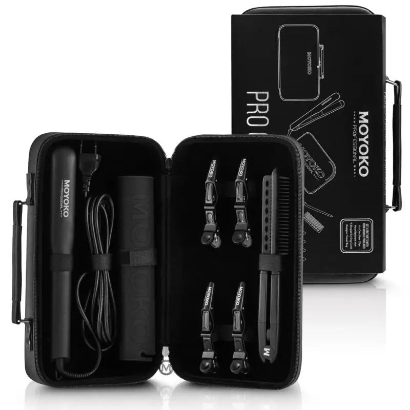 Professional grooming kit with various trimming attachments in a compact black case.