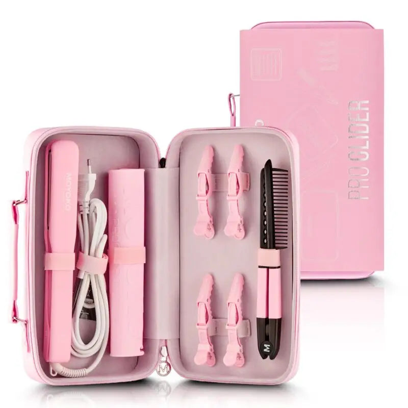 Pink travel case containing hair styling tools and accessories.