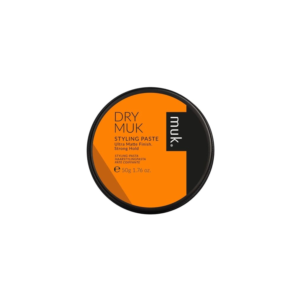 MUK Dry Muk Styling Paste 50g: Ultra-Matte Finish from orange and black circular container