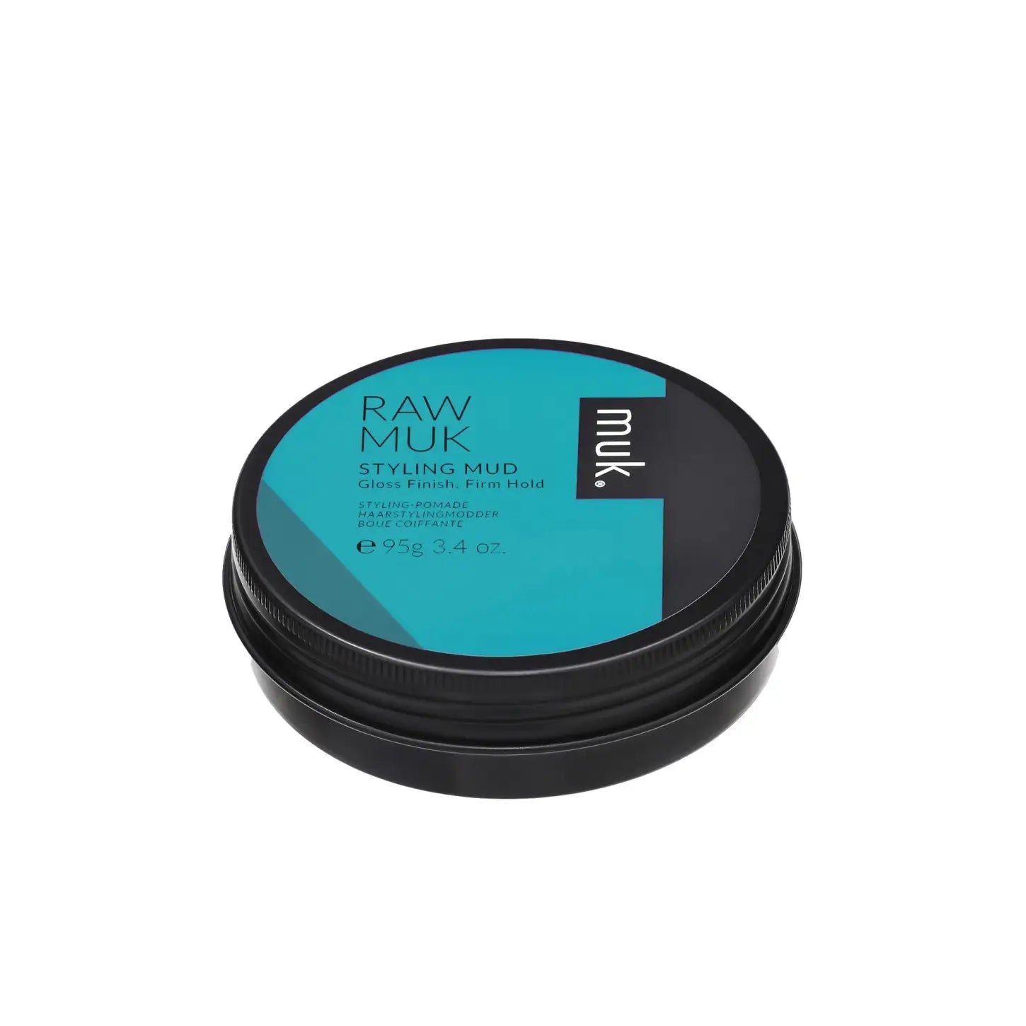 Circular container of Muk Styling Mud with refreshing mango fragrance and teal black label