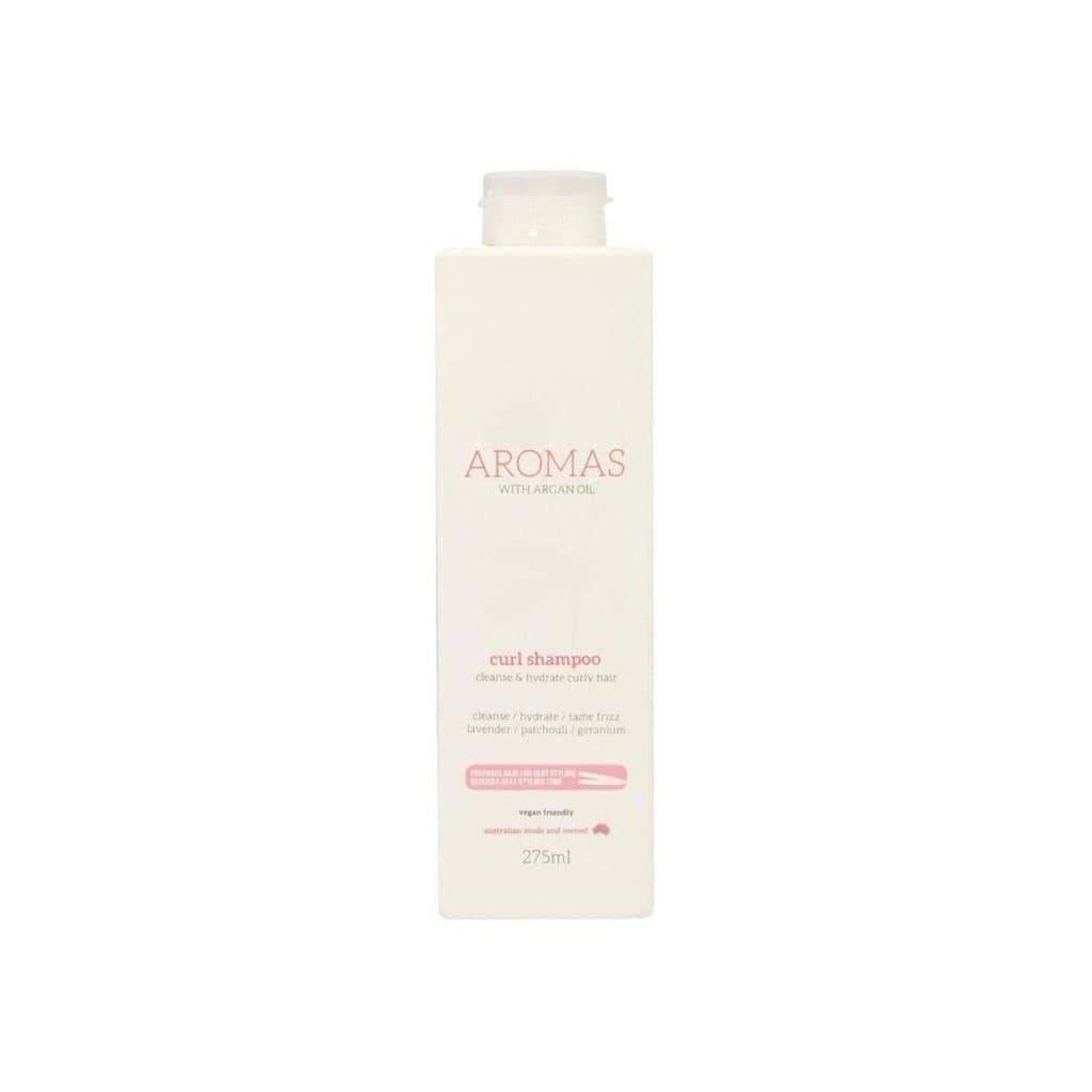 White bottle of Nak Aromas Curl Shampoo with Argan Oil 275ml and pink text