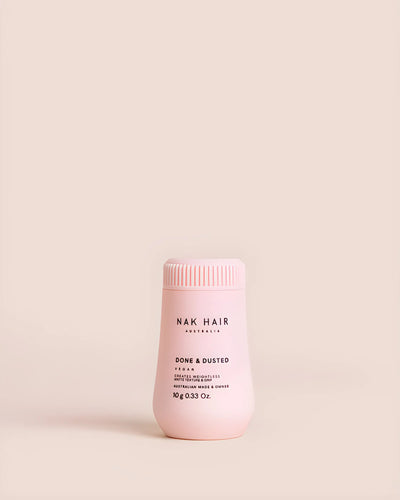 NAK Done & Dusted 10g: Pink bottle of weightless styling powder for ultimate control