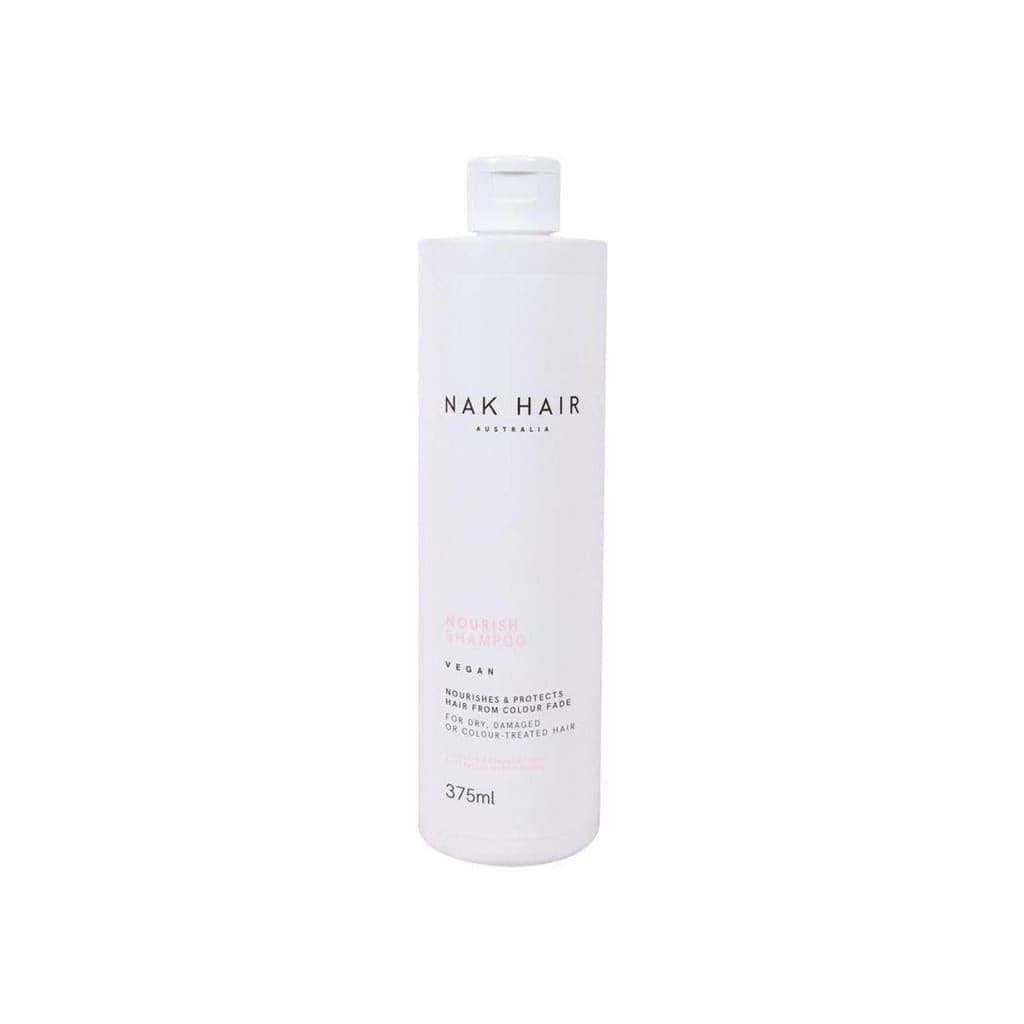 White cylindrical bottle of Nak Signatures Nourish Shampoo 375ml ナ600