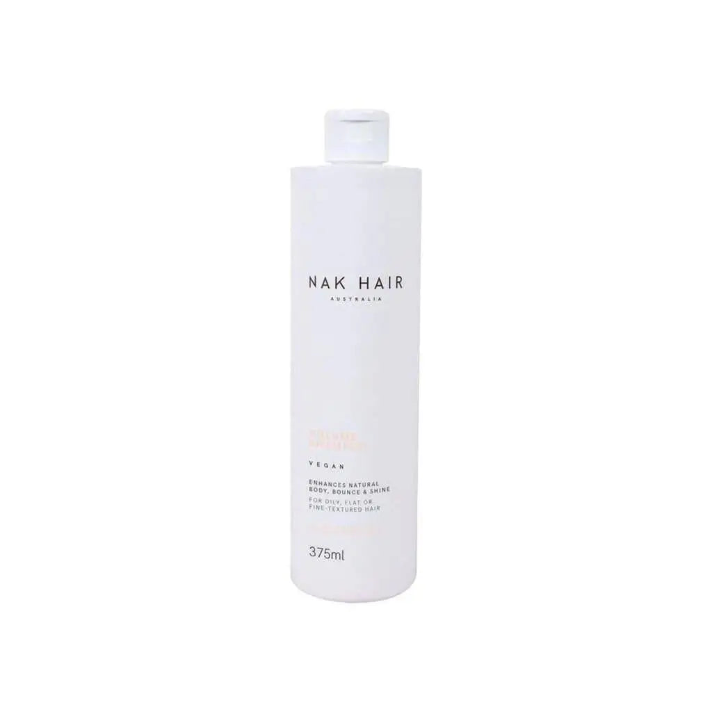 White bottle of Nak Signatures Volume Shampoo 375ml for fuller, voluminous hair