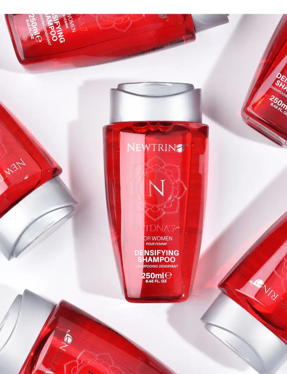 Red bottle of Newtrin densifying mt7 DNA shampoo for women, sulfate/sodium chloride free