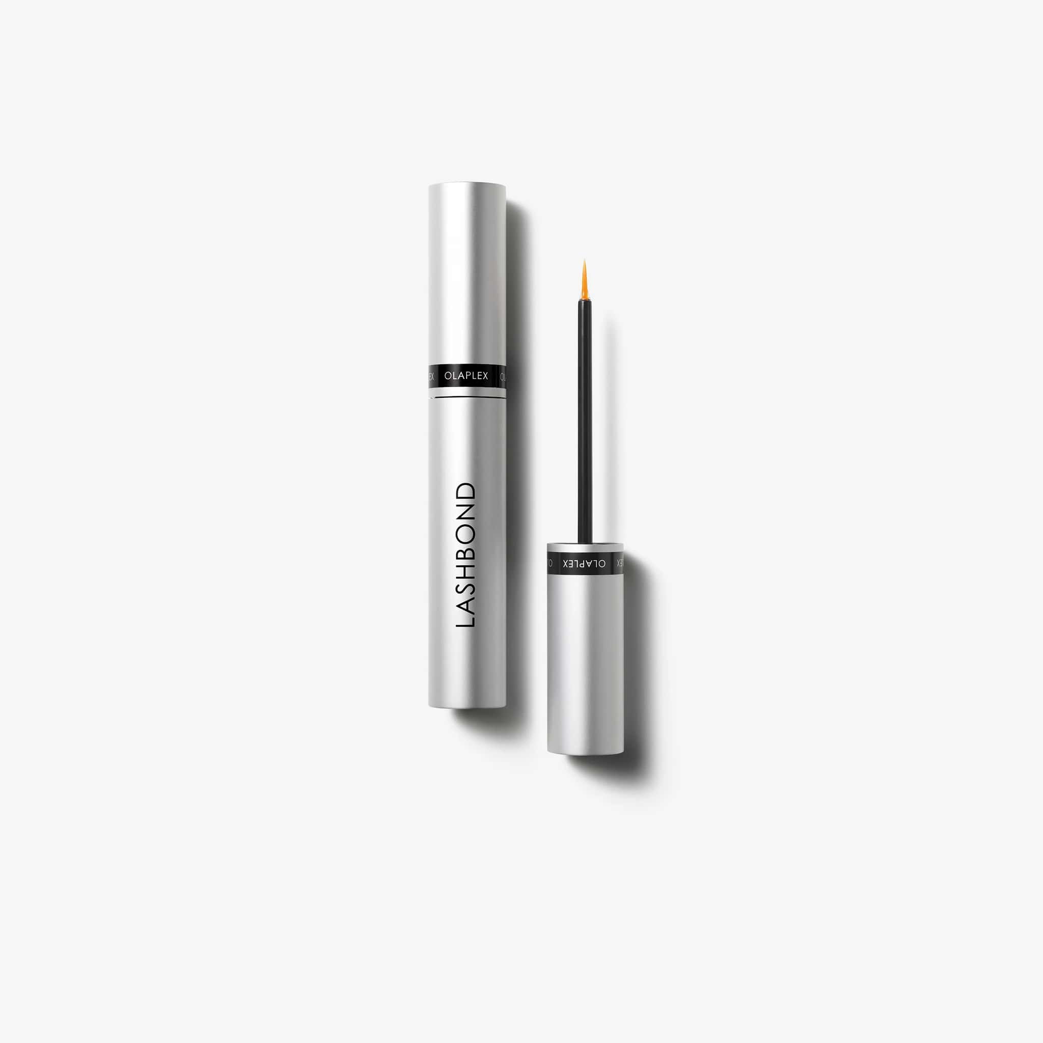 Olaplex Lashbond Serum in sleek silver tube with applicator brush for enhancing lashes and brows