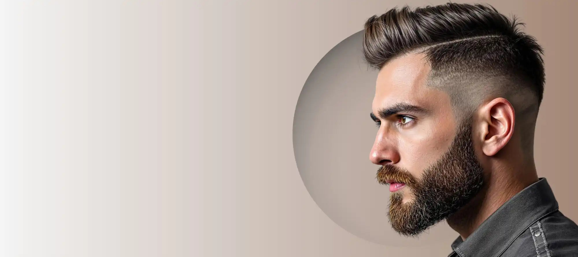 Side profile of a modern men’s hairstyle and beard combination featuring a fade cut and sharp styling.