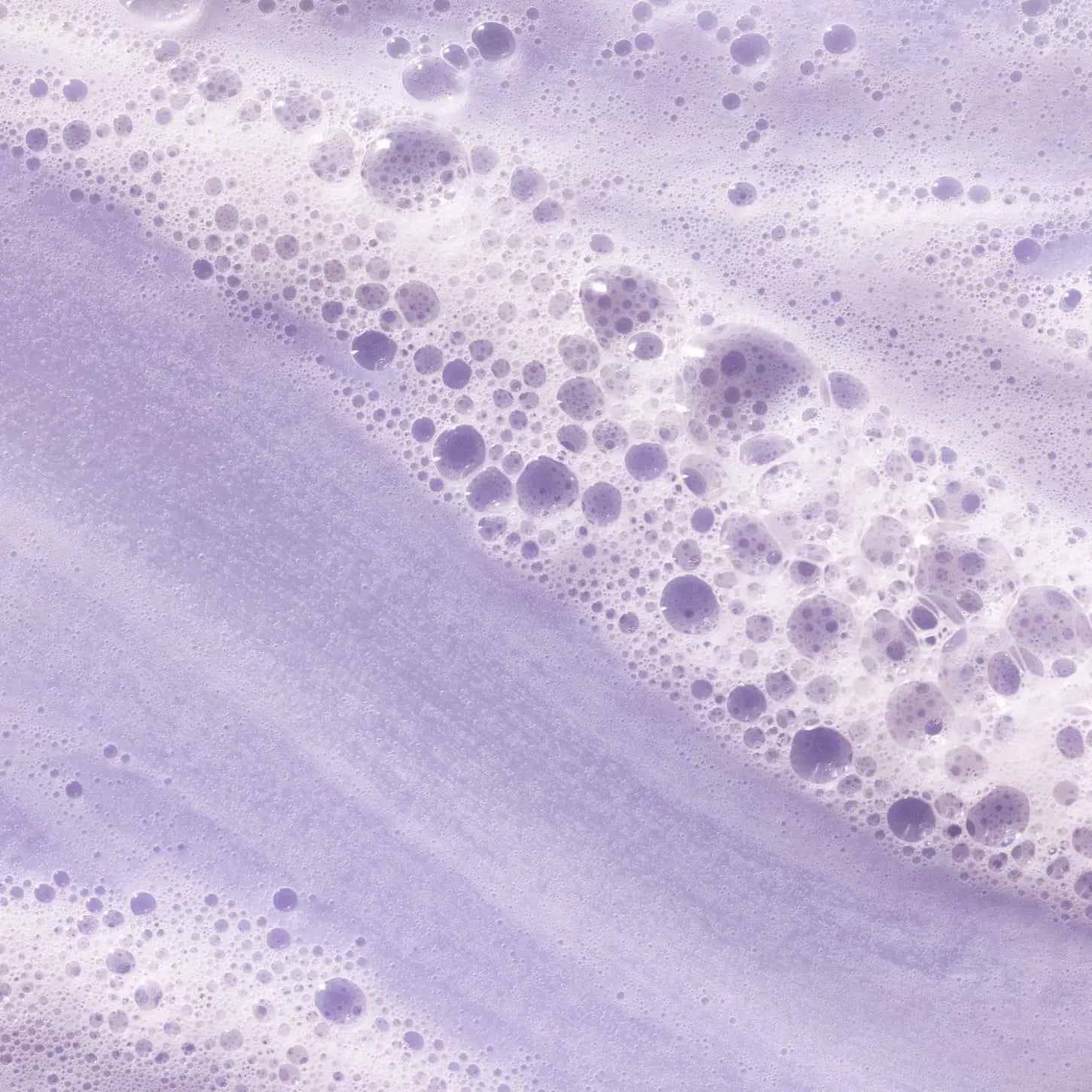 Frothy lavender soap bubbles showcasing Pureology Hydrate Gift Set in South Africa