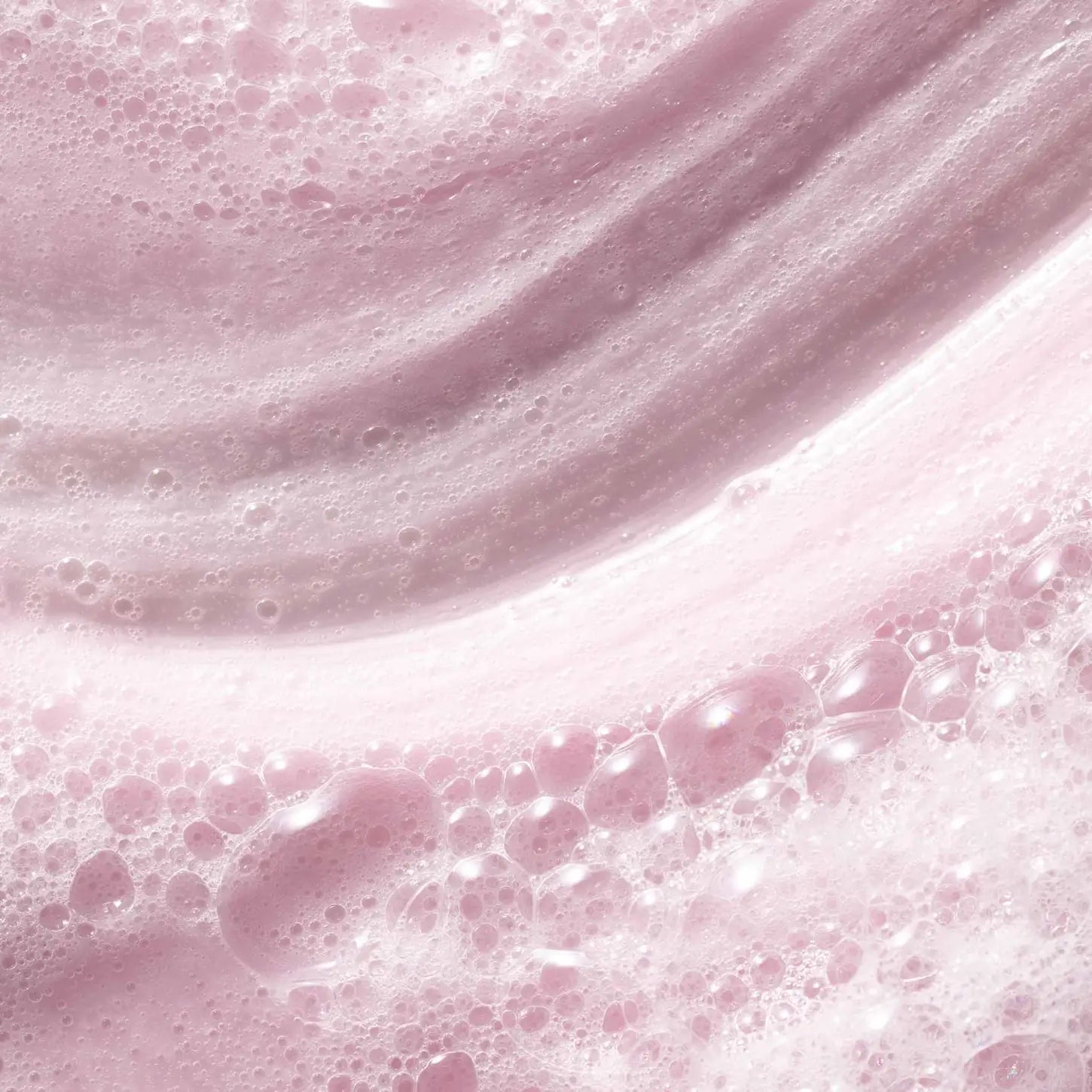 Swirled pink lotion with bubbles from Pureology Pure Volume Gift Set trio