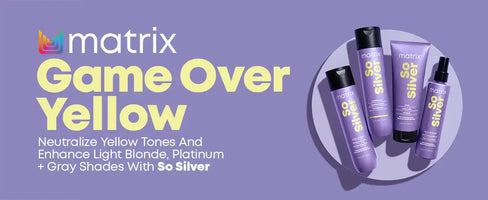 Purple hair care product bottles with ’Matrix Game Over Yellow’ branding.