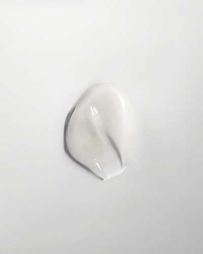 Smooth blow-dried hair styled with QiQi All Out Blowout Cream 180g