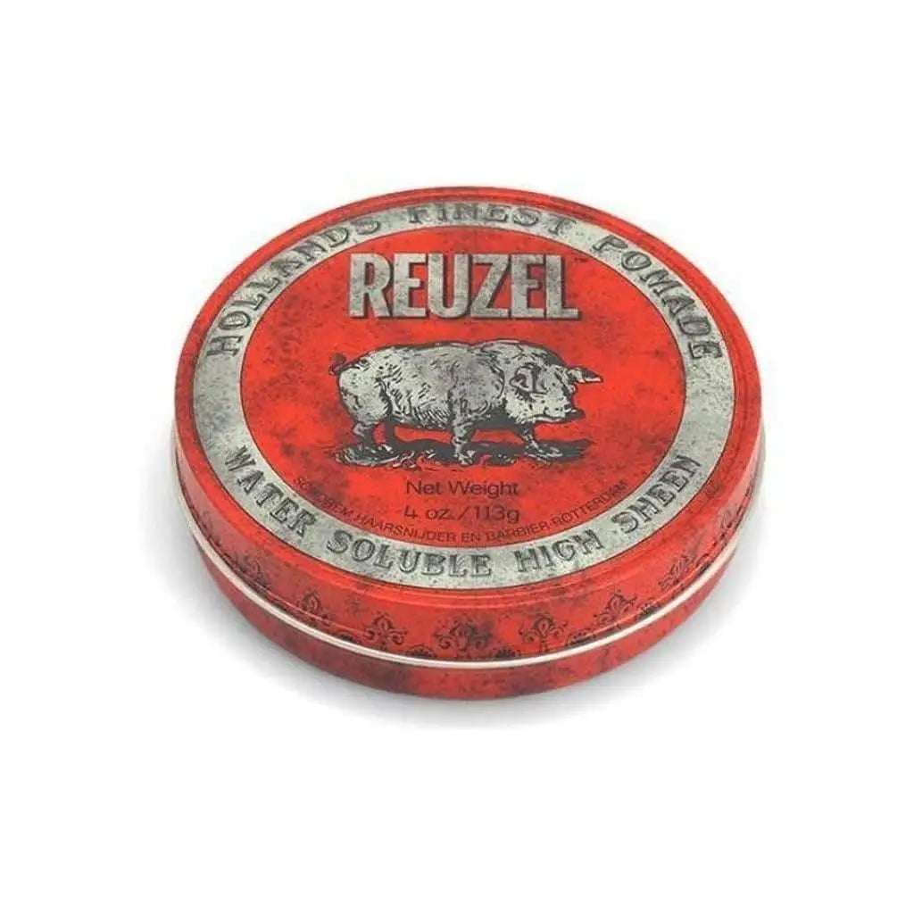 Red circular tin of Reuzel Red Pomade Water Soluble featuring a pig illustration on the lid