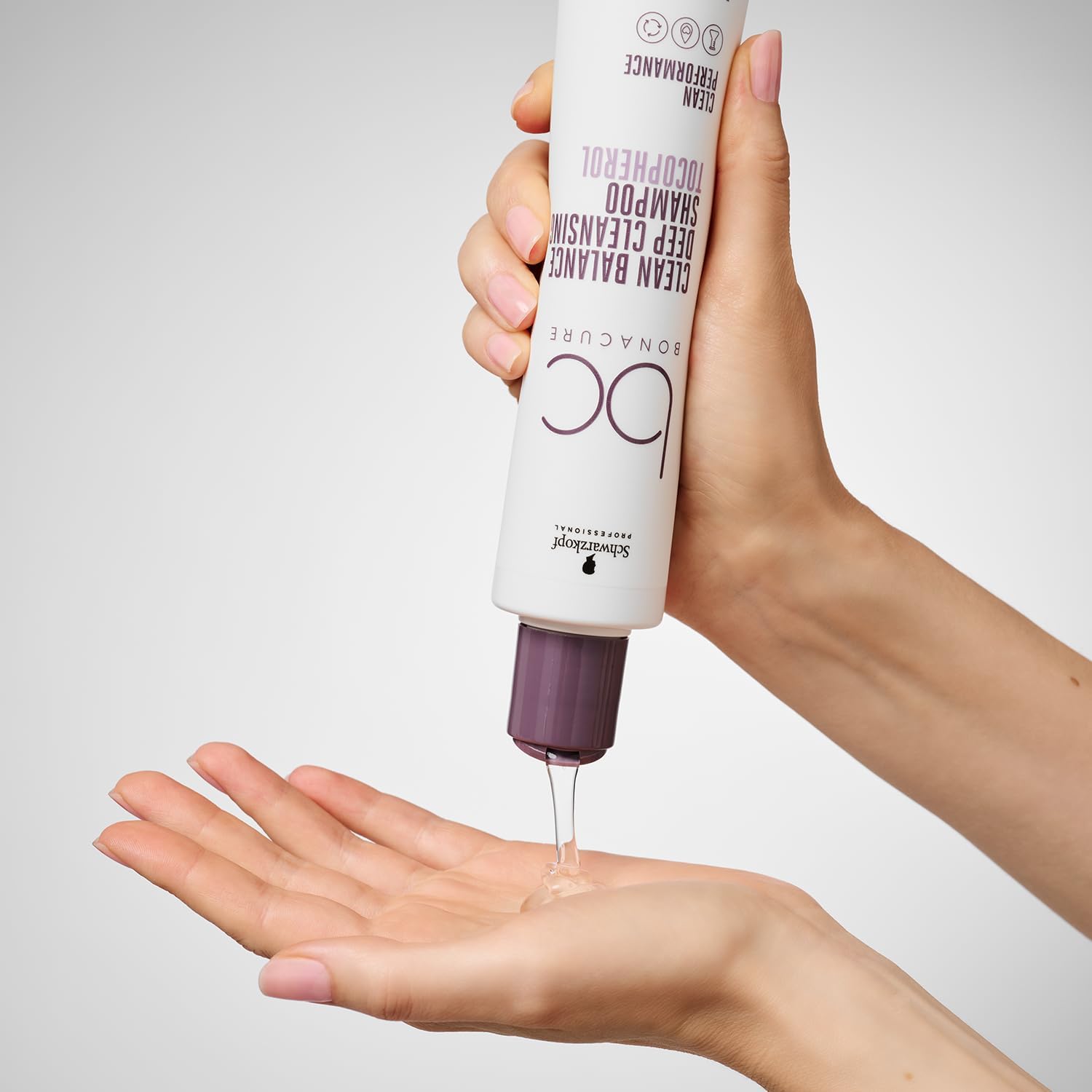 Schwarzkopf BC Clean Balance Deep Cleansing Shampoo 250ml being dispensed into a hand for a refreshing wash.