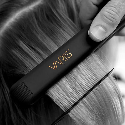 Varis Smoother Hair Straightener: Achieve sleek, shiny hair with this professional styling tool. Featuring ceramic plates & adjustable heat.
