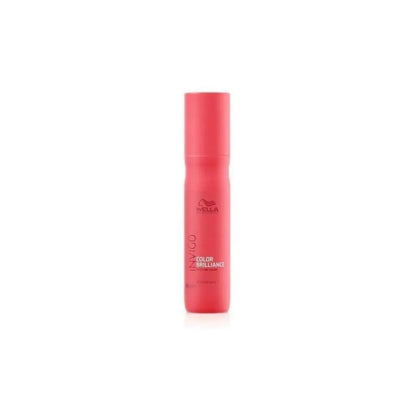 Pink cylindrical bottle of Wella hair product.