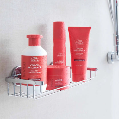 Collection of red Wella Color Brilliance hair care products including Wella Invigo Colour Protection Shampoo - partnershairdesign