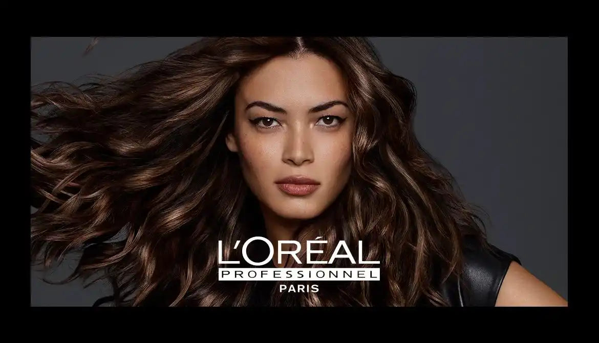 Woman with flowing brown hair in a L’Oreal advertisement.